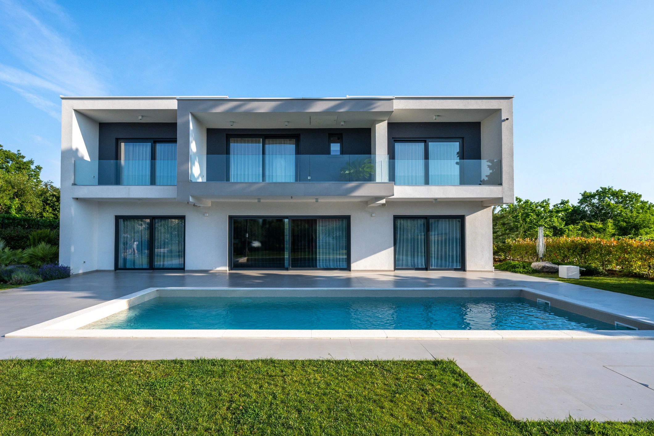 Modern exterior of the home at 12641 15 Av