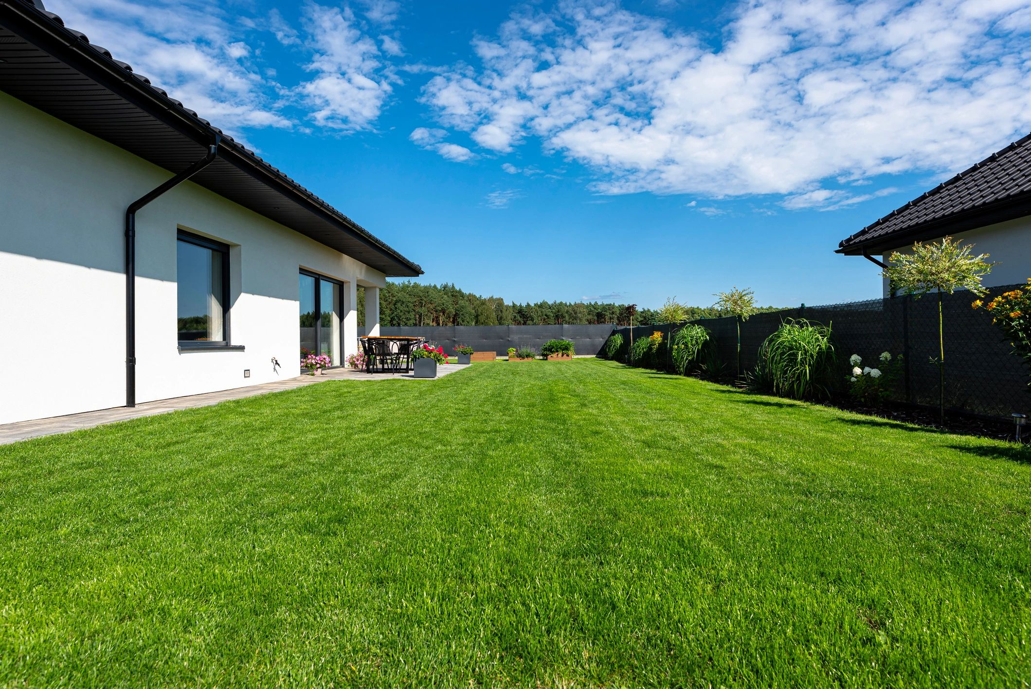 Rear exterior and outdoor area of a modern home